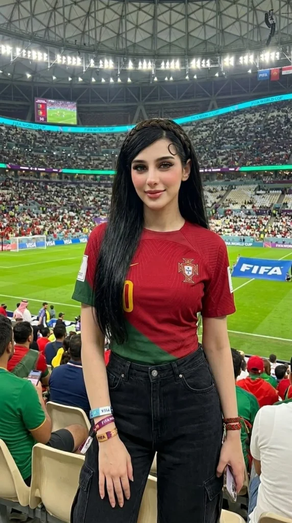 pretty girl in portugal football shirt